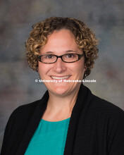 Studio portrait of Jamie Loizzo, New Faculty Photo Shoot, August 19, 2015. 