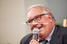 Howard G. Buffett and his son, Howard W. Buffett sits with IANR Vice Chancellor Ronnie Green for a d
