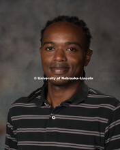 Studio portrait of Nganga (Peter) Muchiri, Assistant Professor, College of Arts and Sciences. New Fa