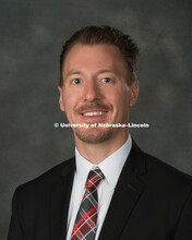 Studio portrait of Blake Runnalls, Assistant Professor of Marketing, College of Business. New Facult