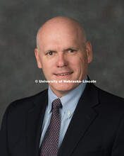 Studio portrait of John Shrader, Assistant Professor of Broadcasting, College of Journalism and Mass