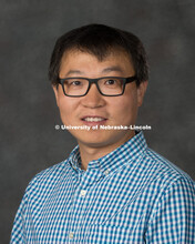Studio portrait of Jinliang Yang, Assistant Professor, Agronomy and Horticulture. New Faculty Orient
