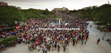 Thousands of students watched at 1:02 pm on the green space between the Nebraska Union and the Raike