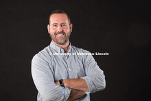 Studio portrait of Michael Burton, Assistant Professor, Textiles, Merchandising and Fashion Design. 