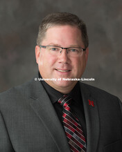 Studio portrait of Christopher Bohn, Coordinator for Defense Research Initiatives, Office of Researc