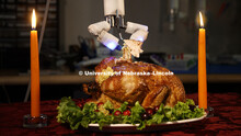 Turkey (actually a chicken) is being carved by a robotic surgery device at Virtual Incision, a start