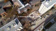 The rubble of Cather Pound dining center is being removed. The two residence halls will be imploded 