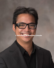 Studio portrait of John Kiat, graduate research assistant for Psychology. December 8, 2017. 