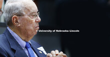 Keith Heuermann listens as Donnie Smith delivers his Heuermann Lecture Tuesday evening at Nebraska i