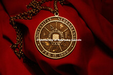 The medallion worn by the University of Nebraska-Lincoln chancellor is the university seal. March 20