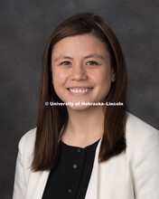 Studio portrait of Tiffany Lee, Research Communication Specialist for the Office of Research, and Sp
