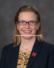 Studio portrait of Kathy Partlow, Senior Proposal Development Coordinator for the Office of Research