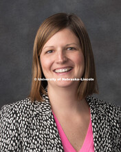 Studio portrait of Liz Lange, National Recognition and Awards Coordinator for the Office of Research