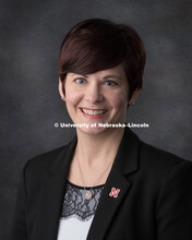 Studio portrait of Ashley Washburn, Director of Research Communications for the Office of Research a