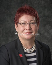 Studio portrait of Elina Ibrayeva, Assistant Professor of Practice, Management. College of Business.