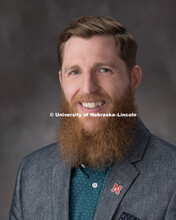 Studio portrait of Seth Burkey, Research Data Analyst for the Office of Research and Economic Develo