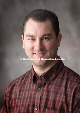 Studio portrait of Shane Kimbrough, Software Engineer for the Office of Research. April 27, 2018. 