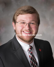 Studio portrait of Alex Souliere, Proposal Development Specialist, Office of Proposal Development. J