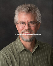 Studio portrait of Gene Dinkelman, Central Administration. August 10, 2018. 