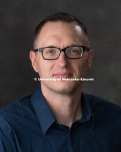 Studio portrait of Travis Heller, Central Administration. August 10, 2018. 