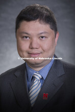 Studio portrait of Peter Zhu, Assistant Professor, College of Business. August 17, 2018. 