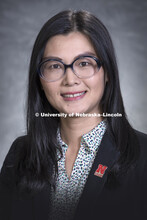 Studio portrait of Yingchao Lan, Assistant Professor, College of Business. August 17, 2018. 
