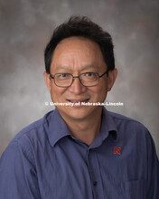 Studio portrait of Liangcheng Du, Professor and Interim Vice Chair, Chemistry. August 20, 2018. 