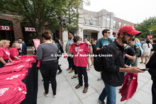 Students line up for free Grit and Glory t-shirts. In Our Grit, Our Glory brand reveal party on city