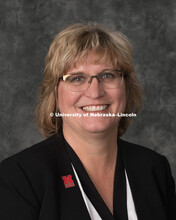 Studio portrait of Chris Timm, Associate Director of Employer Experience and Outreach for the Colleg