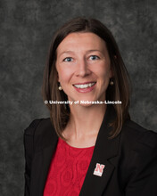 Studio portrait of Kasey Linde, Assistant Director of Teaching and Learning, College of Business. Se