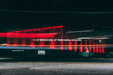 Sheldon Memorial Art Gallery lit up red at night with blurred motion. October 11, 2018. 