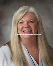 Studio portrait of Kris Baack, Director for Civic Engagement, Student Affairs. November 12, 2018. 