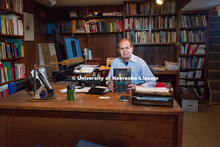 UNL History professor, David Cahan holds a copy of the biography he authored, "Helmholtz: A Life in 