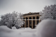 Snow covered lawn in front of Pound Hall on City Campus. January 12, 2019. 