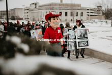 As part of MLK Week, UNL students march with Herbie Husker leading the way in a unifying march throu