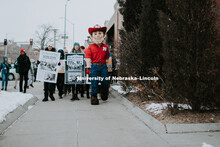 As part of MLK Week, UNL students march with Herbie Husker leading the way in a unifying march throu
