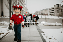 As part of MLK Week, UNL students march with Herbie Husker leading the way in a unifying march throu