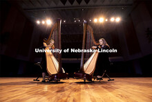 Sarah Brady, left, and Kelly Callahan play the new harps on the Kimball Hall stage. The Glenn Korff 