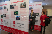 Michael Boehm and Michelle Waite, part of the Chancellor's Executive Team, look over the traveling h