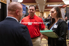 Jill Schindler talks with recruiters from Farm Bureau at the STEM Career Fair (Science, Technology, 