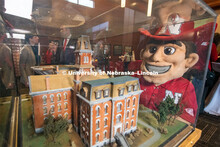 Herbie Husker looks at the replica of old University Hall. Everyone was invited to enjoy a cupcake a