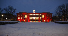 Love Library glows in the celebration and is surrounded by fresh-fallen snow. Glow Big Red bathes th