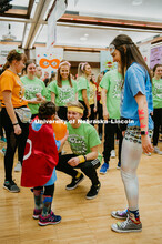 Students learning "Morale dance" with miracle child. 1274 Nebraska students signed up to be part of 