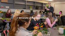 Stacy Adams class, Hort 261- Floral Design 1, in Plant Sciences Hall. Students create floral arrange