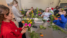 Stacy Adams class, Hort 261- Floral Design 1, in Plant Sciences Hall. Students create floral arrange