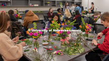 Stacy Adams class, Hort 261- Floral Design 1, in Plant Sciences Hall. Students create floral arrange