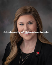 Studio portrait of Justy Bullington, Events Outreach Coordinator for the Office of the Executive Vic
