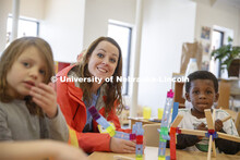 Monica Meyer, senior in Inclusive Child Youth and Family Studies, works with children at the Malone 
