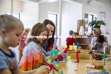 Monica Meyer, senior in Inclusive Child Youth and Family Studies, works with children at the Malone 