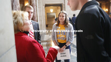 Senator LouAnn Lineham speaks with a group of UNL and UNK students at NU Advocacy Day at the Nebrask